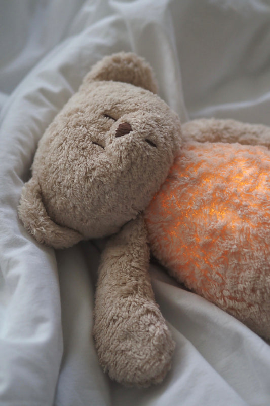 MOONIE - Peluche bruit rose naturel