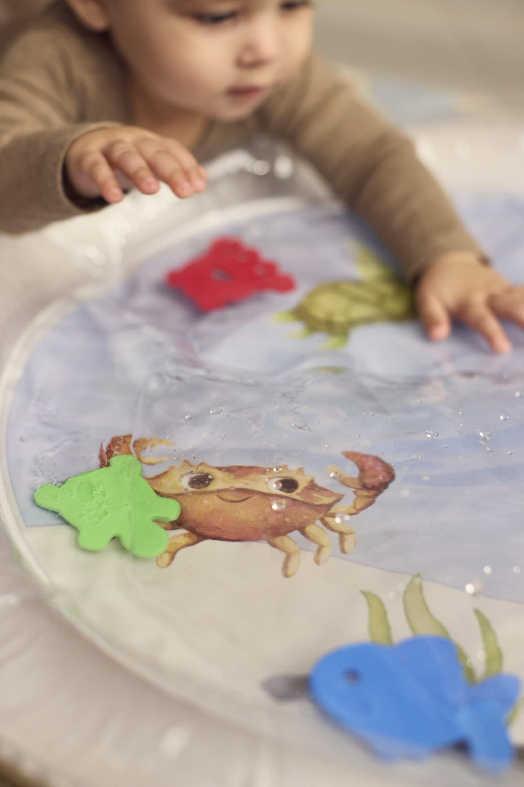 Tapis d'eau pour temps sur le ventre I Amis de la mer 